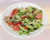 Cucumber and tomatoes salad with walnuts