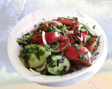 Cucumber and tomatoes salad with olive oil